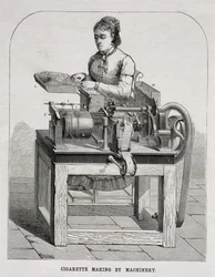 A woman operating a French cigarette-rolling machine, 1878